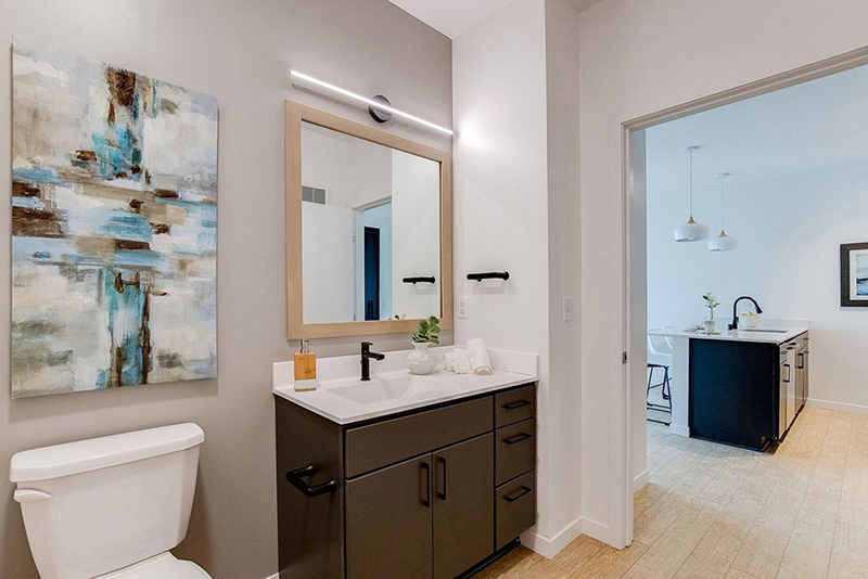 the bathroom with a view out to the kitchen